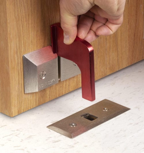 NIGHTLOCK® LOCKDOWN 1 Nightlock Lockdown 1 for either inward or outward-swinging doors. NIGHTLOCK LOCKDOWN 1 is anchored securely to the floor and uses the strength of the floor itself to provide protection.